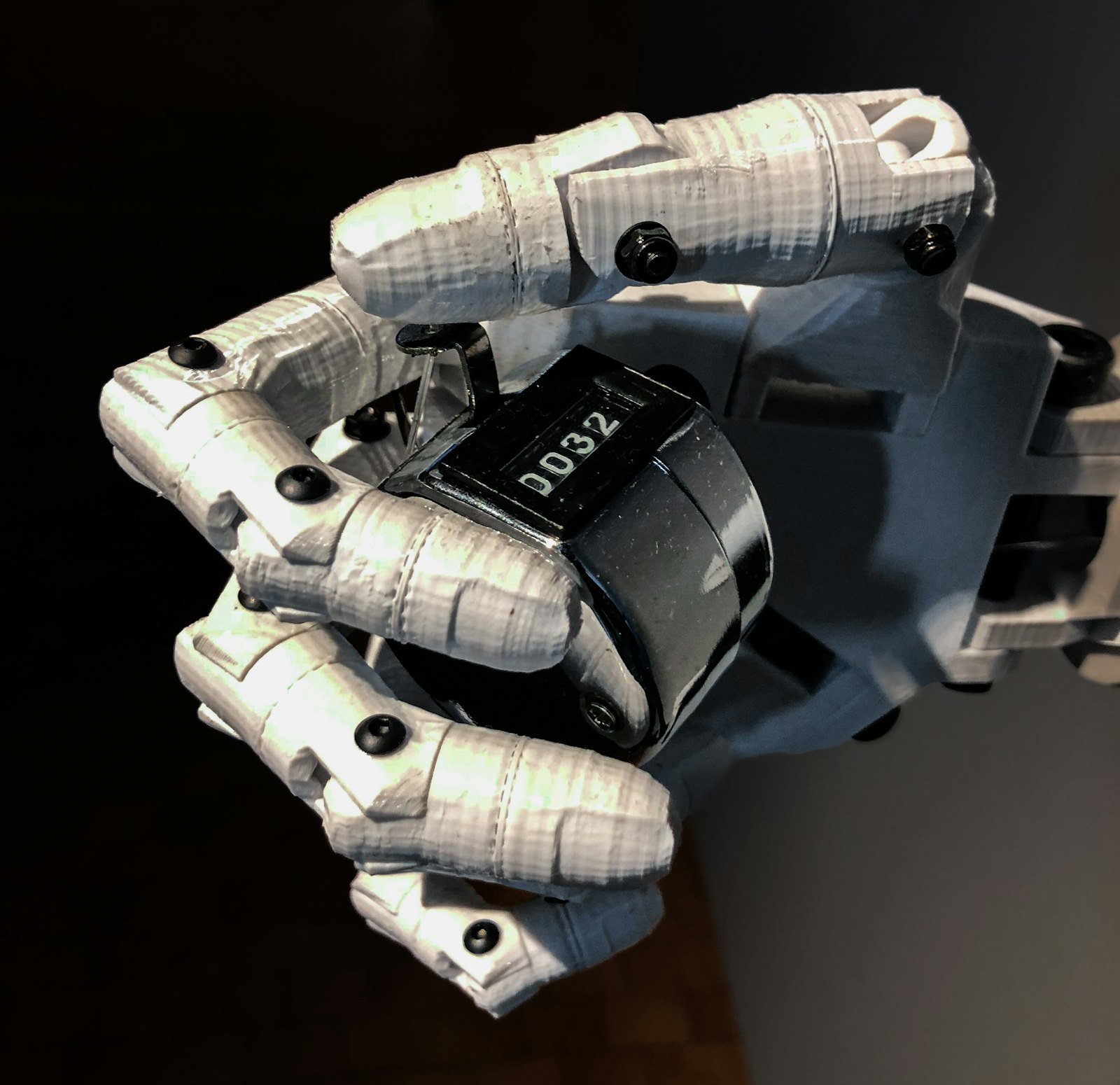 A robotic hand reaching forward