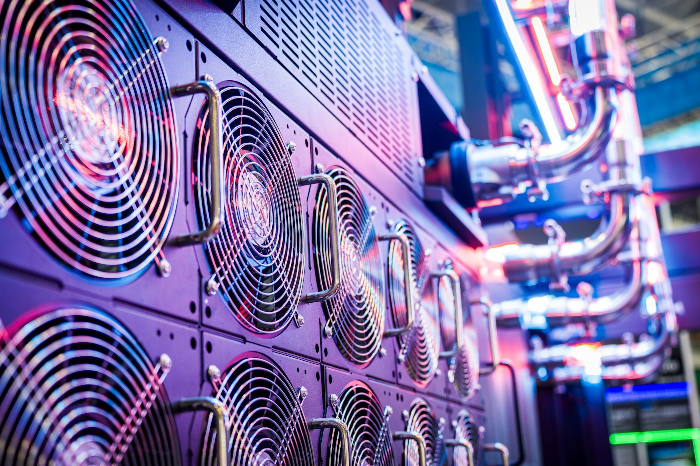 Rows of illuminated servers in a data centre